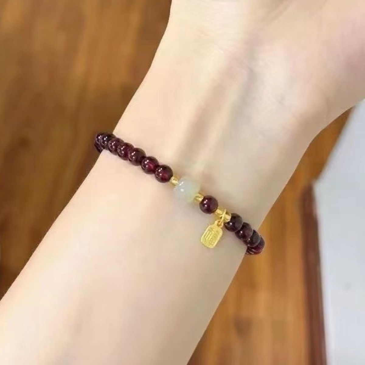 Burgundy Garnet Wrap Bracelet flat lay detail thumbnail